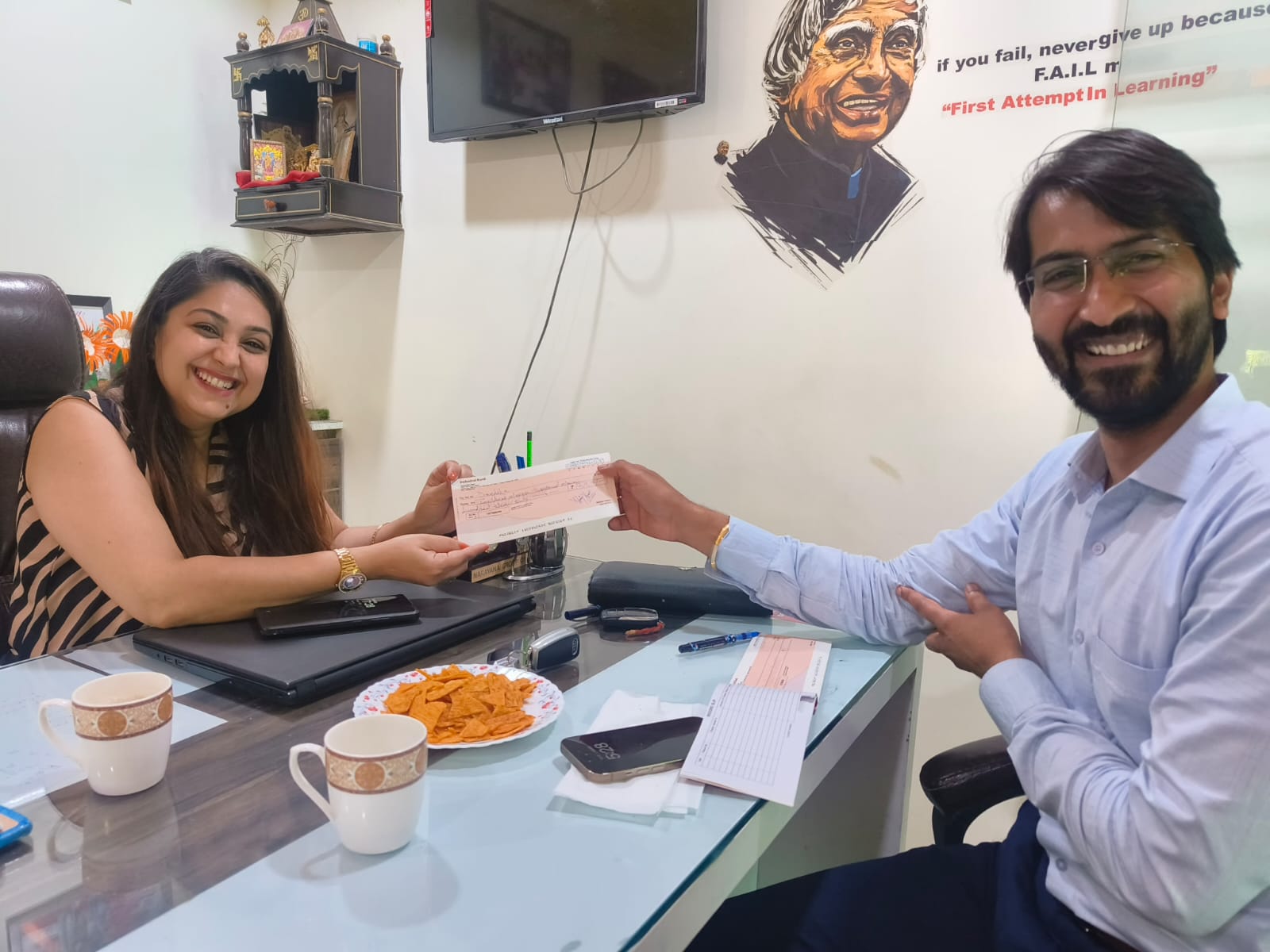 Manufacturing founder reviewing operational charts